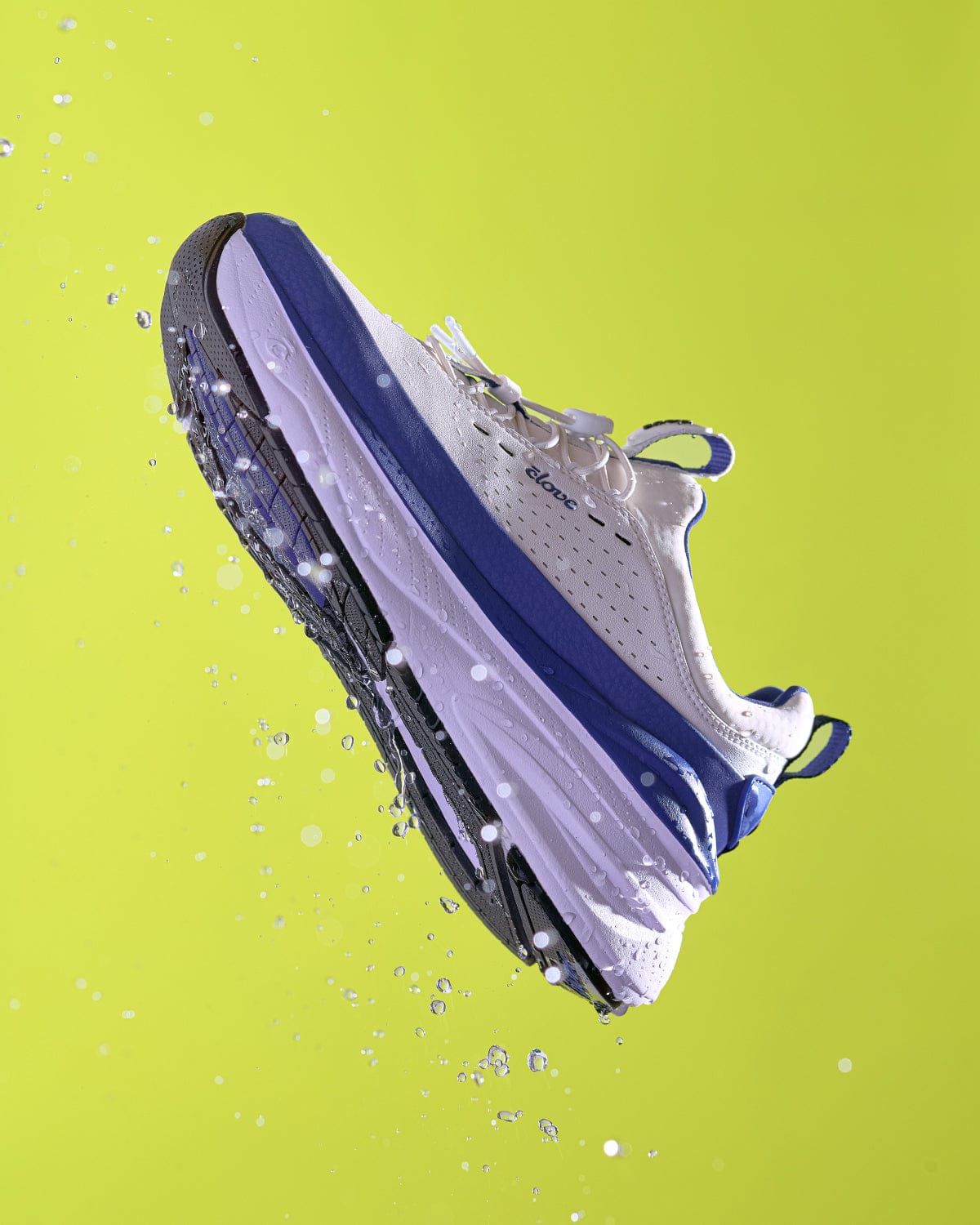 forte-2-white-navy_Yellow_Background_Waterproof_Waterdrops+Side_View