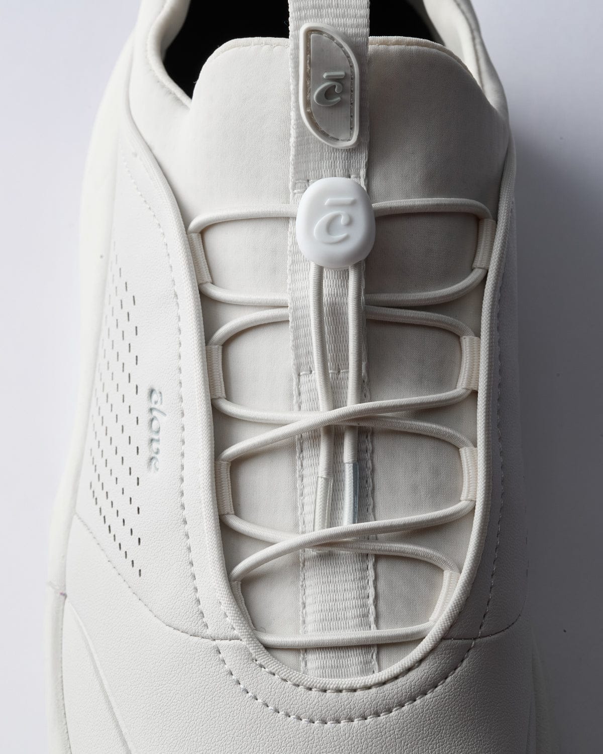 prima-brilliant-white_Laces_zoomed_In_White_Background_Clarino_Material